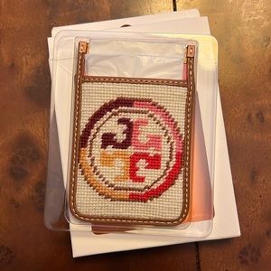 Tory Burch, credit card holder that fits on the back of any cell phone
